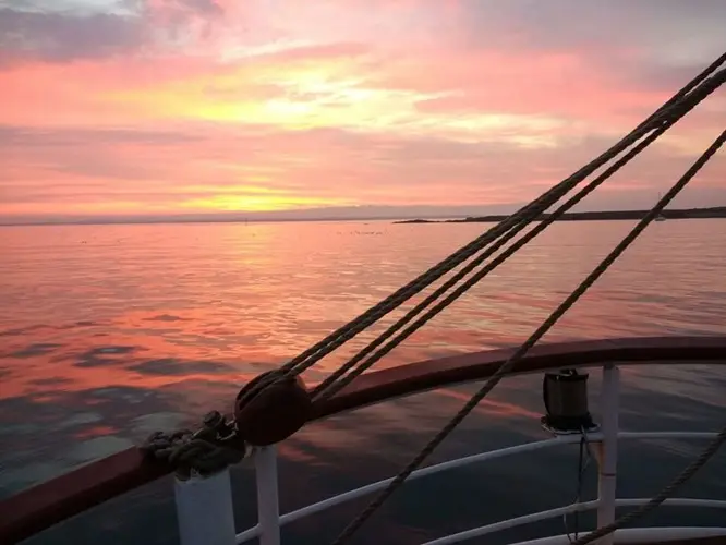 Sunset viewed from the deck of Tall Ship Morgenster during the sailing cruise from A Coruña to Port Blanc.