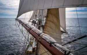 Crew members working aloft on Morgenster’s yardarms
